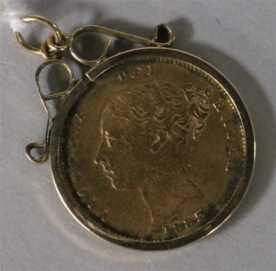 A Victoria 1885 gold half sovereign, now in 9ct gold pendant mount.
